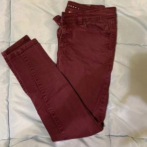 Burgundy skinny jeans